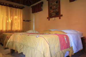 Ritmo Tropical Hotel Beds On Bungalow
 - Costa Rica